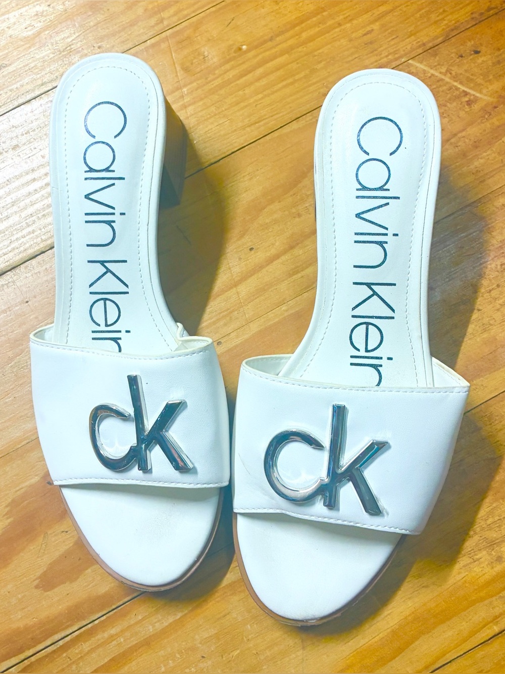 Calvin Klein White Slide Mules with Silver CK Emblem